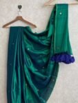 Most trending peacock color gini tissue saree __For orders 9080256146(HEIC)